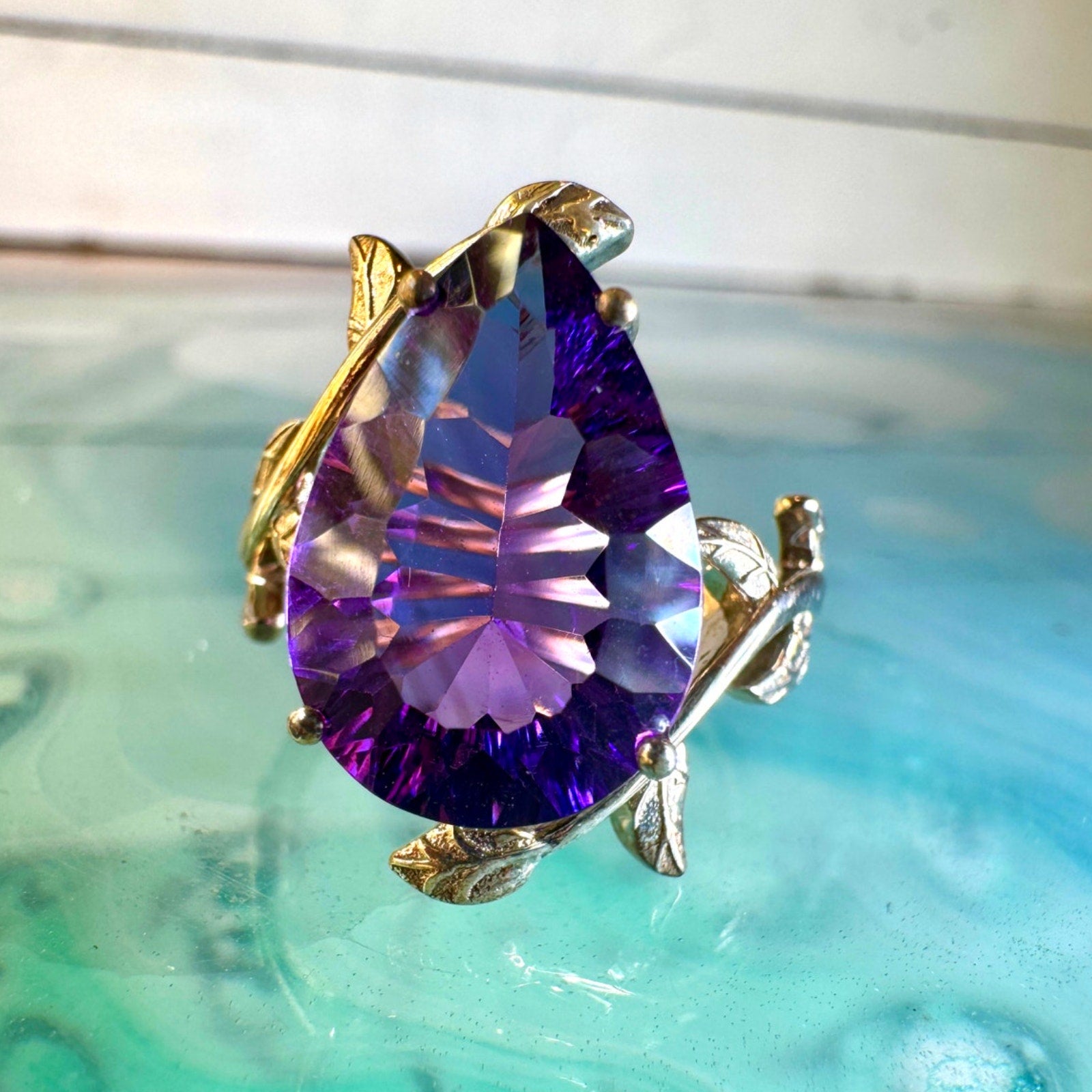 elegant gemstone jewelry pieces on neutral background